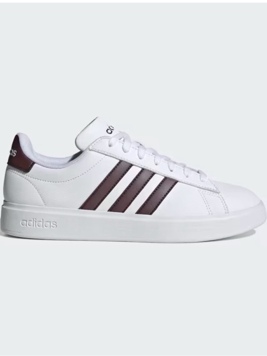 adidas Shoes - adidas White Low-Top Sneakers with Brown Stripes
